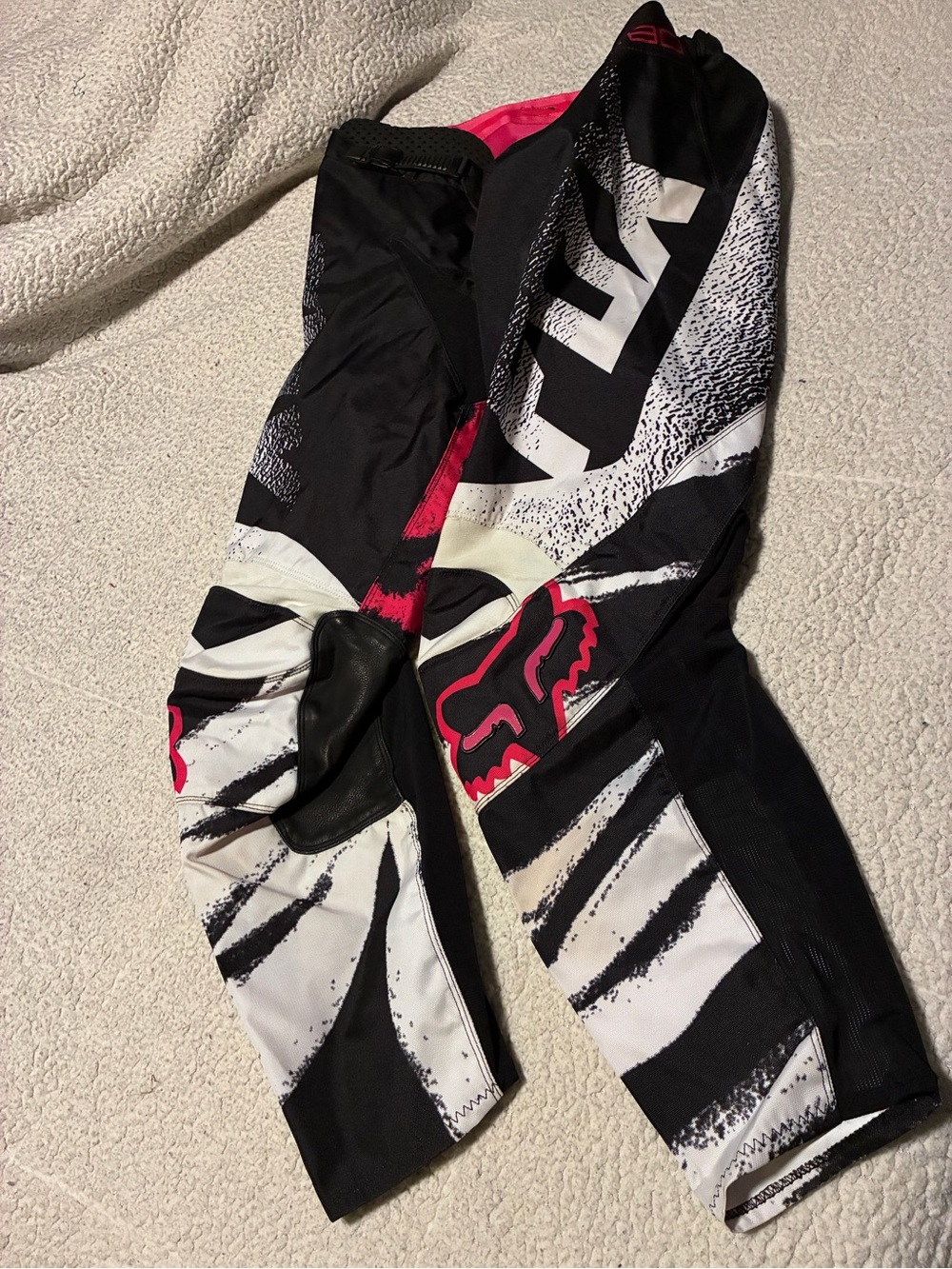 Fox racing woman’s  Black, White & Pink Motocross 180 Pants, size 11/12